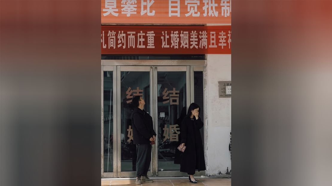 A former couple in front of a civil affairs department in Henan, China.