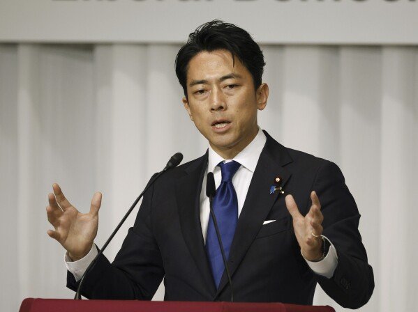 Japan's former Environment Minister Shinjiro Koizumi, a candidate of Japan's ruling Liberal Democratic Party (LDP) presidential election, speaks during a joint news conference at the party's headquarters in Tokyo Friday, Sept. 13, 2024. (Franck Robichon/Pool Photo via AP)