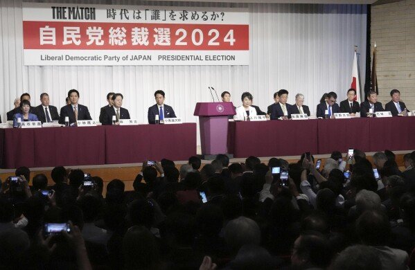 The candidates of the ruling Liberal Democratic Party for the party's upcoming presidential election attend the meeting of their speeches at the party's headquarters in Tokyo, Japan Thursday, Sept.12, 2024. Candidates are front row from from left, Economic Security Minister Sanae Takaichi, former Economic Security Minister Takayuki Kobayashi, Chief Cabinet Secretary Yoshimasa Hayashi, former Environment Minister Shinjiro Koizumi, Foreign Minister Yoko Kamikawa, former Chief Cabinet Secretary Katsunobu Kato, Digital Minister Taro Kono, former Defense Minister Shigeru Ishiba and Liberal Democratic Party’s Secretary General Toshimitsu Motegi at the party’s headquarters n Tokyo, Japan Thursday, Sept. 12, 2024. (Kyodo News via AP)