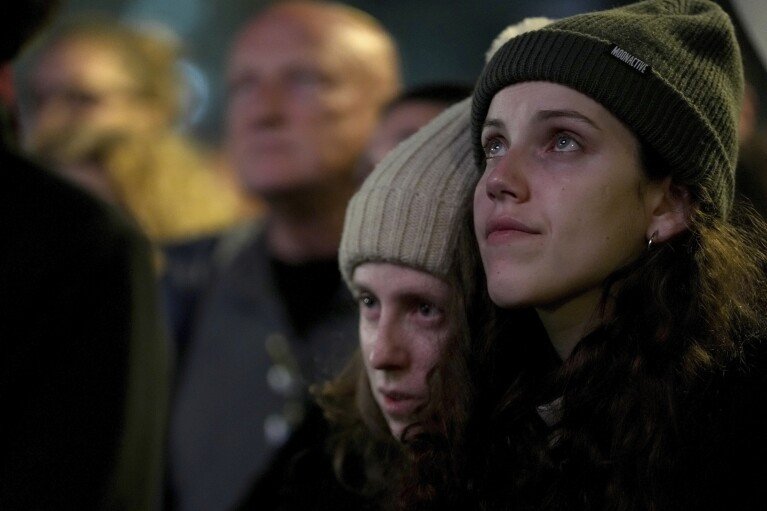 Relatives and friends of people killed and abducted by Hamas and taken into Gaza, gather calling for their released in Tel Aviv, Israel on Saturday, Jan. 18, 2025. (AP Photo/Maya Alleruzzo)
