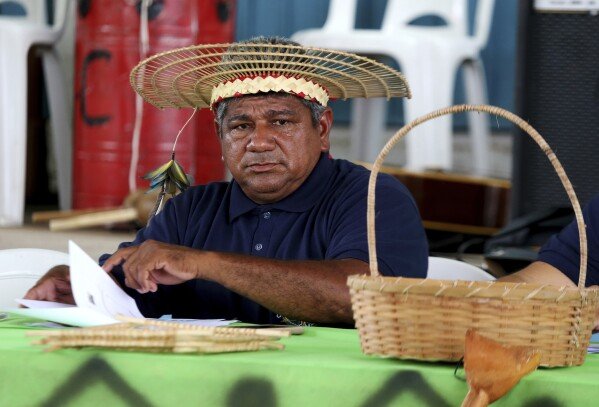 Aldinelson Moraes Pavao, a leader of the Mura Indigenous Council, attends an assembly with members of the Mura community, in Autazes, Amazonas state, Brazil, Wednesday, Feb. 19, 2025. (AP Photo/Edmar Barros)